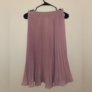 Women’s pink pleated flowy midi skirt